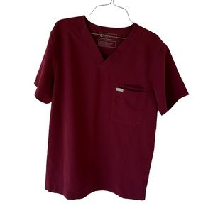 FIGS women’s burgundy two pocket scrub top
Size M GUC
